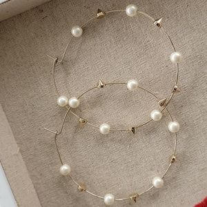 Large hoop earrings.  Excellent condition.  Comes with gift box ready to gift.